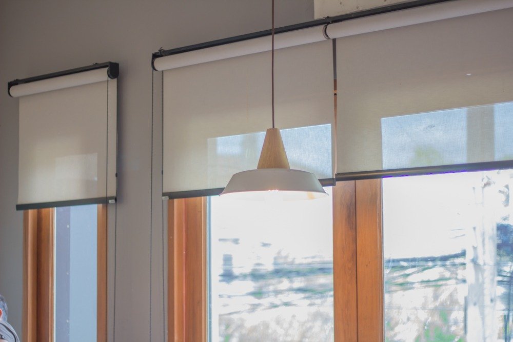 White,Roller,Blind,And,Window.